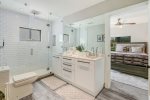 Shared full-bathroom features a double vanity sink -removes clutter-